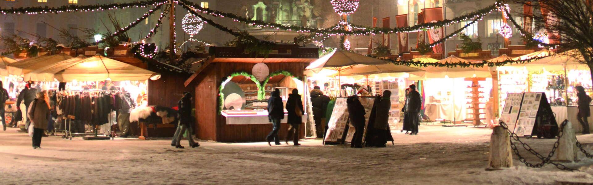 Stalls in the Main Square in Krakow at night.